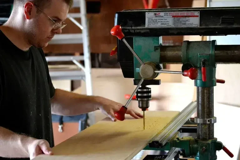 Man working on wood project with the Best Floor Drill Press - Electronics Tool